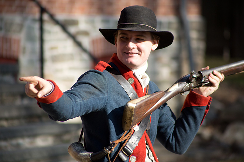 man holding musket